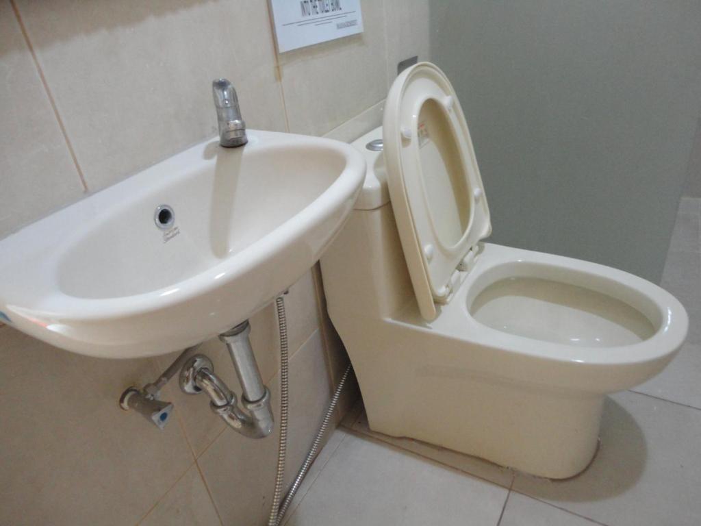 Urbanview Hotel Wayan Mansion دنباسار المظهر الخارجي الصورة